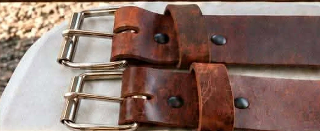 Brown standard buffalo leather belts showing roller-bar buckles